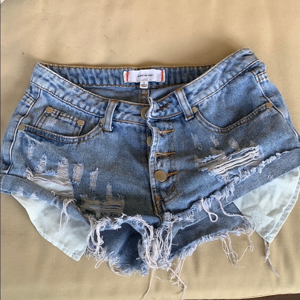 Distressed jean shorts